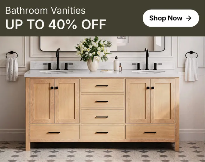 White oak vanity with shaker doors and marble top, styled with round mirror and greenery in a bright bathroom.