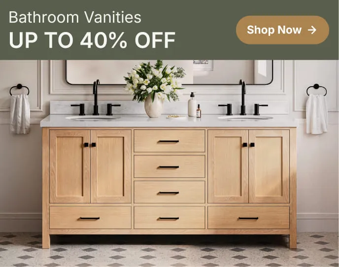 White oak vanity with shaker doors and marble top, styled with round mirror and greenery in a bright bathroom.