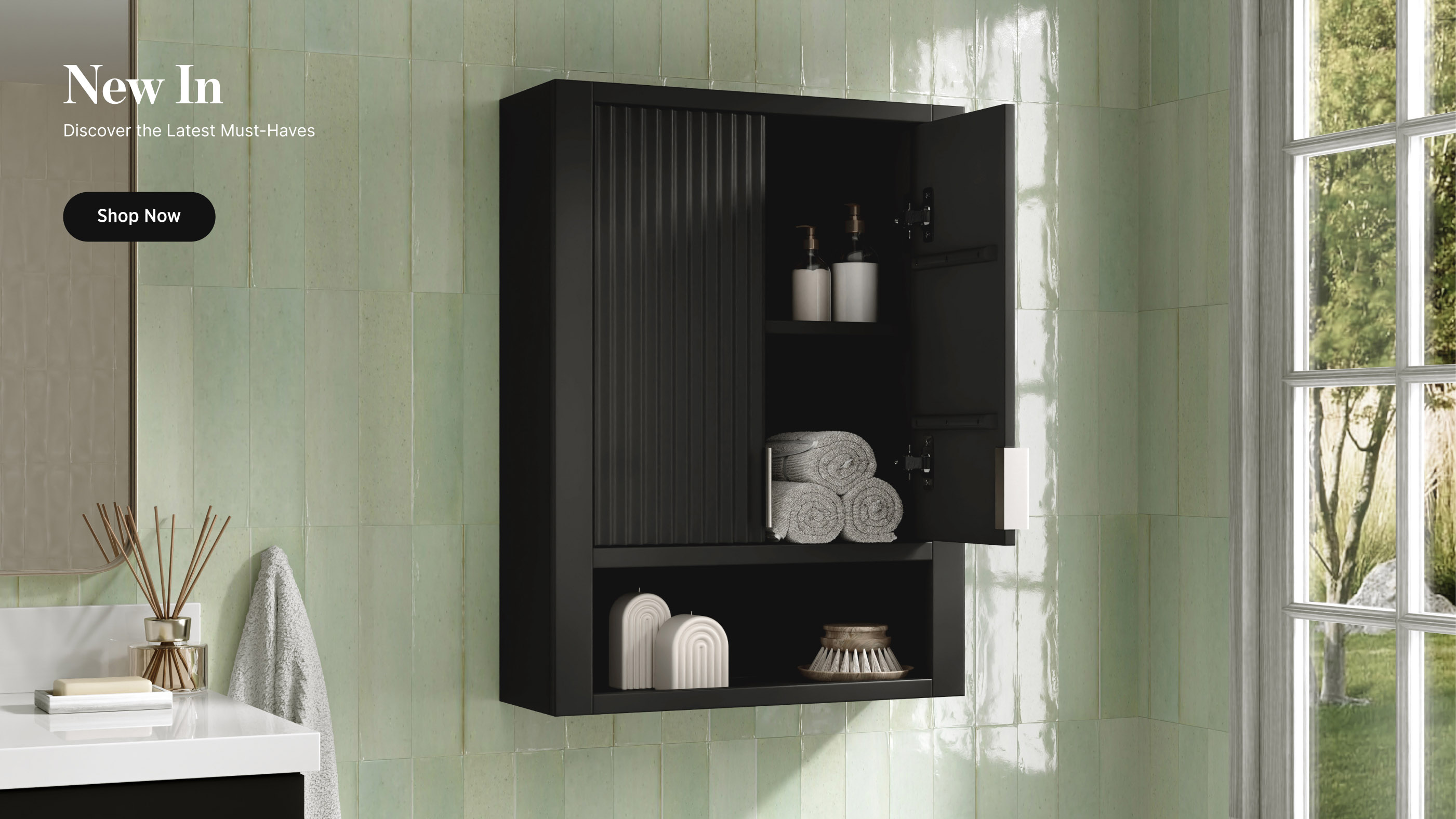 Oak wall cabinet with black hardware promotes New In collection with Shop Now button.