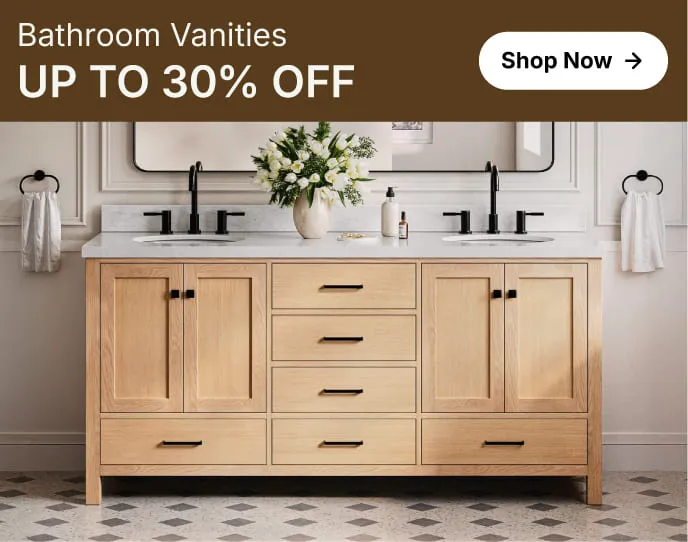 White oak vanity with shaker doors and marble top, styled with round mirror and greenery in a bright bathroom.