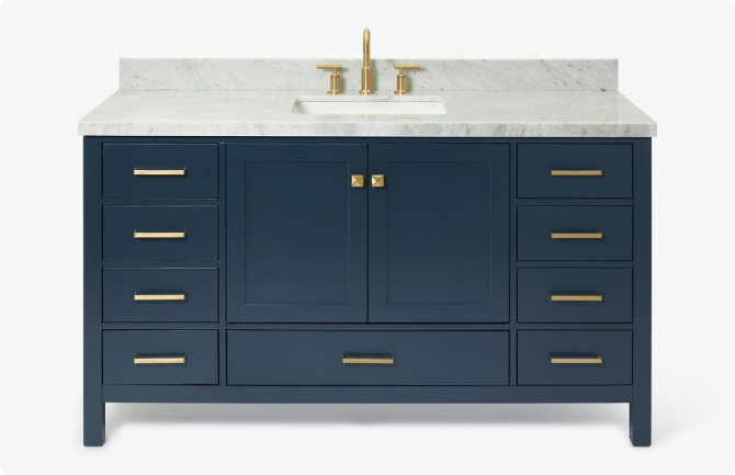 Navy blue vanity with white top and brushed gold hardware