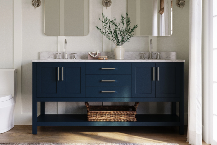 Midnight blue double vanity with marble top and gold hardware, styled with three mirrors and woven basket below.
